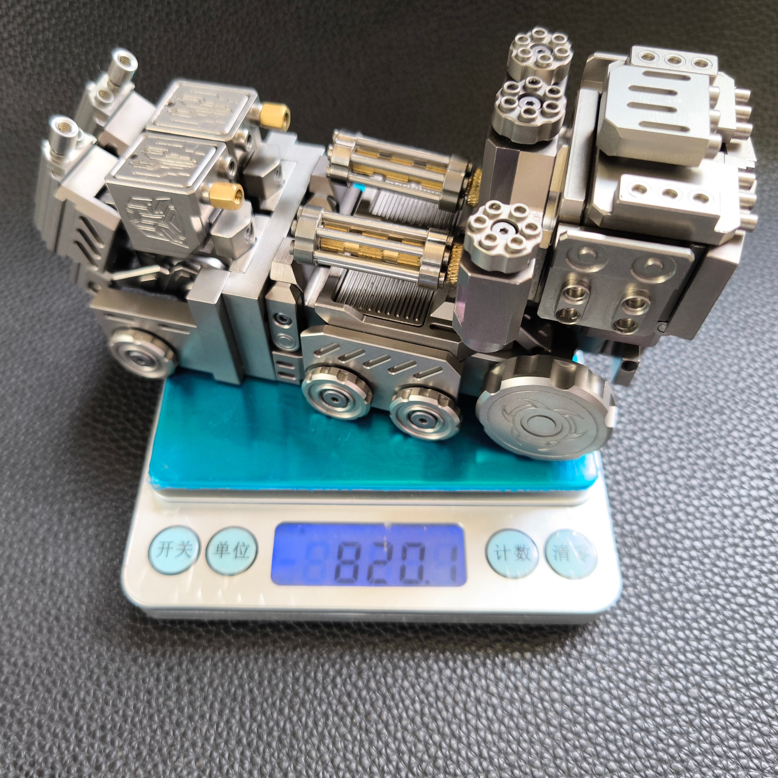 Titanium alloy, CNC machined, Optimus Prime Junior.